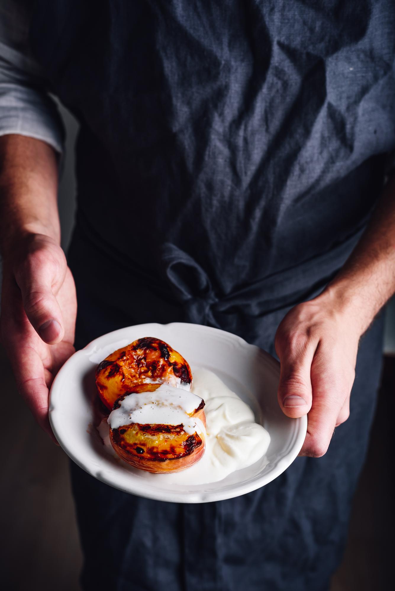 Chef plating a minimalist gourmet dish